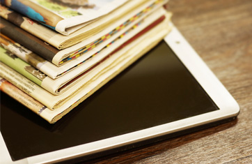 Newspapers on an electronic tablet