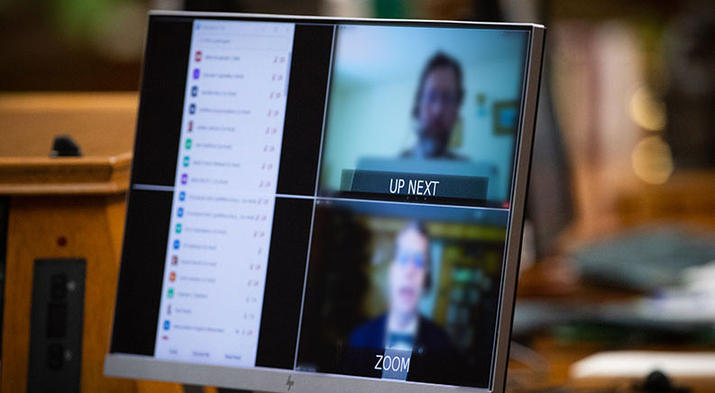 Photo of a computer screen presenting a virtual committee meeting