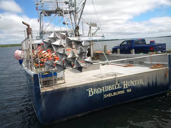 Wide lobster fishing boat in Shelburne, Nova Scotia.