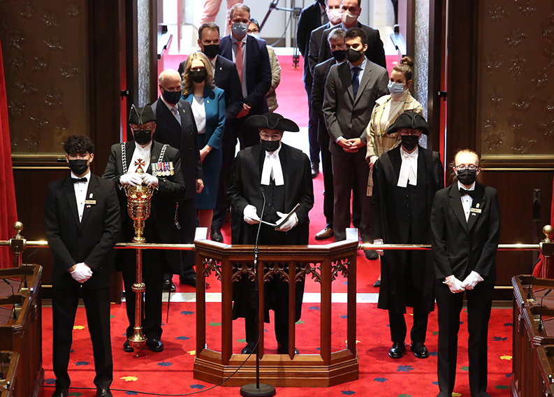 Speaker Rota during the Speech from the Throne on November 23, 2022. The Speaker of the House and Members of Parliament may only enter the Senate Chamber as far as the brass bar at its entrance, a barrier that symbolizes the independence of the two houses of Parliament.