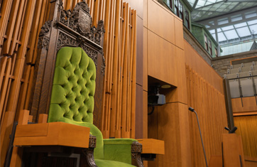 The green oak chair where the Speaker sits in the Chamber